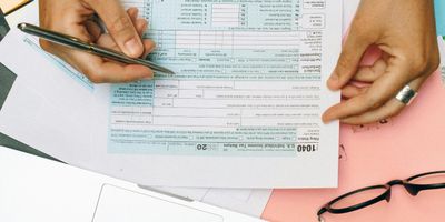 Close-up of tax form 1040 being filled out